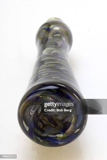 Still life of a glass pipe known as a "chillum".