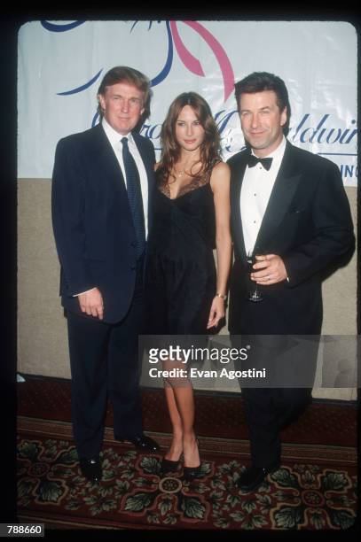 Donald Trump, Melania Knauss, and Alec Baldwin attends the Baldwin Cancer Benefit October 8, 1999 in New York City. The Carol M. Baldwin Breast...