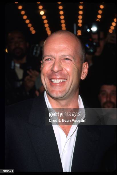 Actor Bruce Willis poses October 10, 1999 at the Ziegfeld Theatre in New York City. Willis attends the premiere of the film "The Story Of Us."