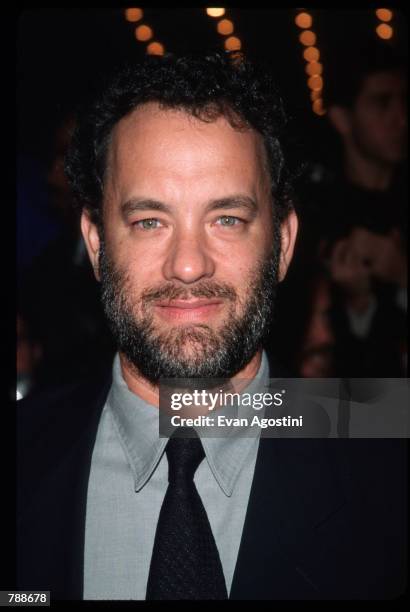 Actor Tom Hanks poses October 10, 1999 at the Ziegfeld Theatre in New York City. Hanks attends the premiere of the film "The Story Of Us."