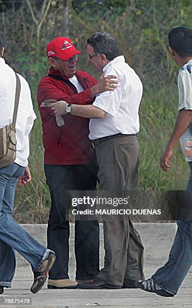 Colombian Peace Commissioner Luis Carlos Restrepo hugs former Venezuelan Interior and Justice Minister Ramon Rodriguez Chacin 10 January, 2008 at the...