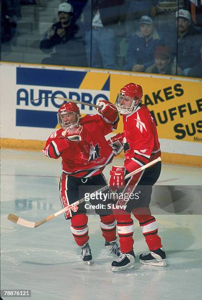 Canadian ice hockey players Marty Murray and Jason Allison of Team Canada on the ice during a game at the 1995 World Junior Championships, where Team...