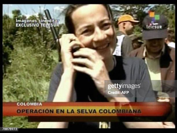 Grab from Venezuelan channel Telesur of Colombian politician Clara Rojas speaks on a mobile phone just after the Revolutionary Armed Forces of...