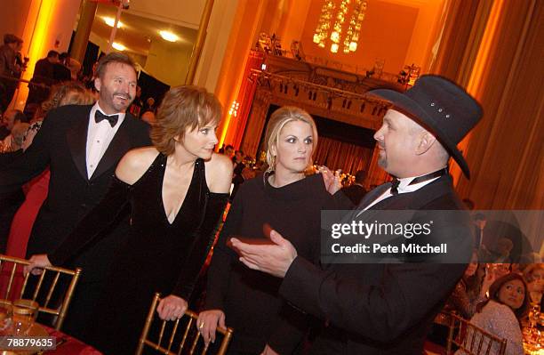 Reba McEntire and her husband Narvel Blackstock, with Trisha Yearwood and Garth Brooks at the Kennedy Center Honors.