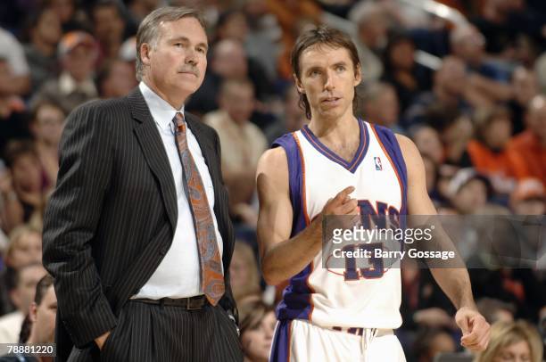Head coach Mike D'Antoni and Steve Nash of the Phoenix Suns talk strategy during the game against the Toronto Raptors at U.S. Airways Center on...