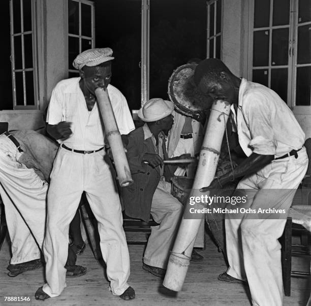 Group of musicians play vaccines and drums at a party in 1946 in Port-au-Prince, Haiti.