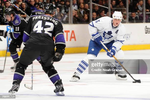 Tomas Kaberle of the Toronto Maple Leafs handles the puck against Tom Preissing of the Los Angeles Kings on January 10, 2008 at Staples Center in Los...