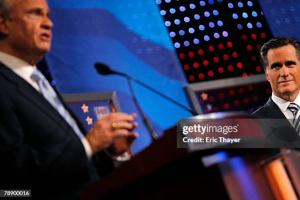 Republican presidential hopefuls former U.S. Sen. Fred Thompson and former Massachusetts Gov. Mitt Romney participate in a televised debate at the...