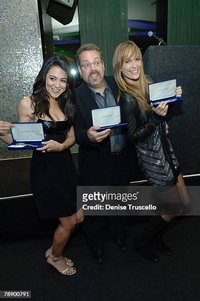 Actress Camille Guaty, creator and executive producer of "Las Vegas" Gary Scott Thompson and actress Molly Sims pose for photos at the "Keys to the...