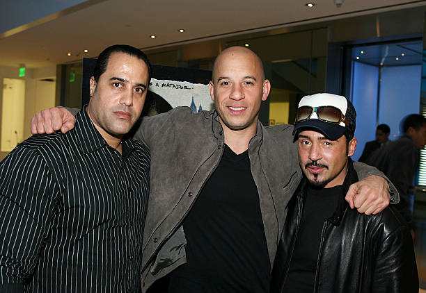 Actors Valentino Morales, Vin Diesel, and Joey Dedio attend Vin Diesel's DVD release party for the film "Strays" held at Creative Artists Agency on...