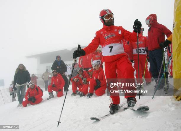 Former Formula One Champion Michael Schumacher of Germany waits his turn to take part on a skiing race during the WROOM F1 Press Meeting on January...