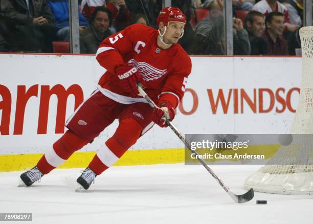 Nicklas Lidstrom of the Detroit Red Wings carries the puck in a game against the Minnesota Wild on January 10, 2008 at the Joe Louis Arena in...