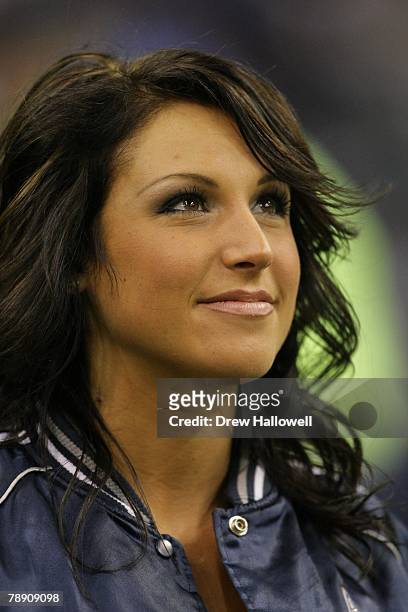 Dallas Cowboys cheerleader stands on the sideline during the game against the Philadelphia Eagles on December 16, 2007 at Texas Stadium in Irving,...