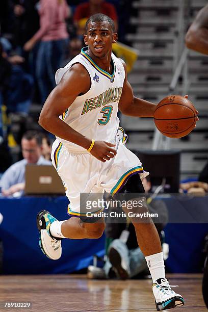 Chris Paul of the New Orleans Hornets drives the ball against the Miami Heat on January 11, 2008 at the New Orleans Arena in New Orleans, Louisiana....