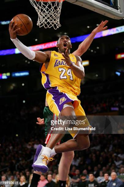 Kobe Bryant of the Los Angeles Lakers puts a shot up against the Milwaukee Bucks at Staples Center January 11, 2008 in Los Angeles, California. NOTE...