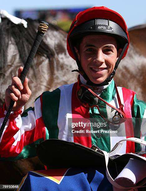 Dean Holland riding Lucky Diva wins the Robert Taranto Handicap during the Rubiton Stakes Day held at Caulfield Racecourse January 12, 2008 in...