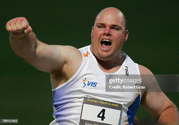 Scott Martin of Australia celebrates after throwing a distance that qualified for the olympic games during the Sydney Track Classic held at Sydney...