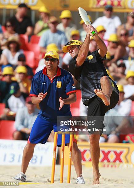Nathan Astle of New Zealand hits a six against England during the Beach Cricket Tri-Nations Series held at Maroubra Beach January 12, 2008 in Sydney,...