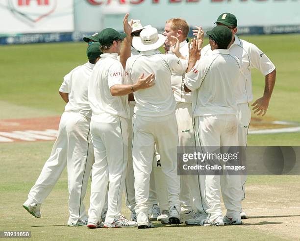 South Africa's Shaun Pollock celebrates the wicket of Runako Morto with his teammates during Day 3 of the 3rd Test match between South Africa and...