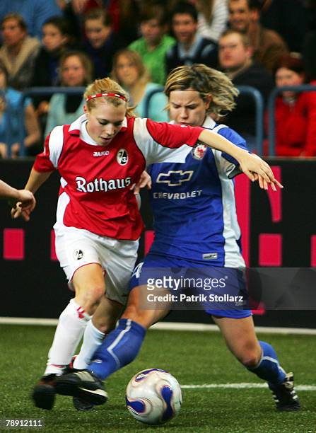 Valeria Kleiner of Freiburg fights Leni Larsen Kaurin during the Women's Indoor T-Home Cup match between SC Freiburg and 1.FFC Turbine Potsdam at the...
