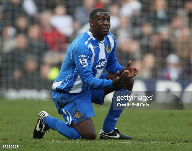 Emile Heskey of Wigan Athletic gestures following a tackle by Robbie Savage of Derby County during the Barclays Premier League match between Derby...