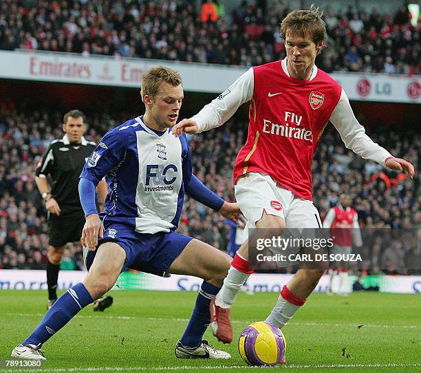 Birmingham City's Swedish midfielder Sebastian Larsson vies with Arsenal's Belarussian midfielder Alexander Hleb during their Premiership match 12...