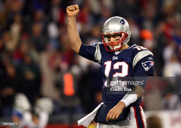 Tom Brady of the New England Patriots celebrates after throwing a touchdown to Wes Welker in the third quarter against the Jacksonville Jaguars...