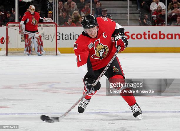 Daniel Alfredsson of the Ottawa Senators fires a slap-shot against the Detroit Red Wings at Scotiabank Place on January 12, 2008 in Ottawa, Ontario,...