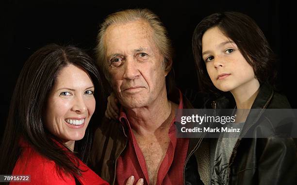 Actor David Carradine , his wife Annie Bierman and son Max pose during the 2008 World Experience DPA gift lounge held at the The Peninsula Hotel on...