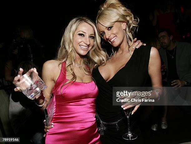 Actresses Sammi Rhodes and Stormy Daniels pose for photos at a naughty night to remember at TAO Nightclub at The Venetian Hotel and Casino Resort on...