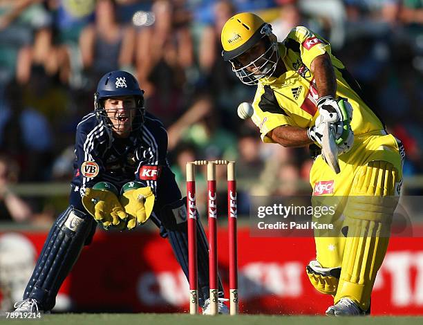 Theo Doropoulos of the Warriors hits out during the Twenty20 Big Bash Final match between the Western Australian Warriors and the Victorian...