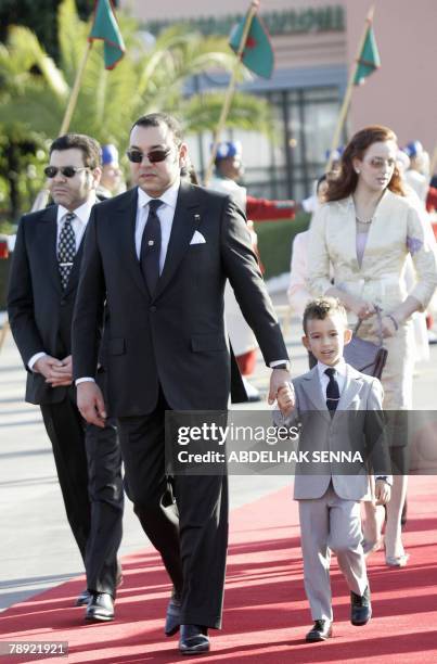 The King of Morocco Mohammed VI , his son Prince Hassan III , and his wife Lalla Salma welcome Jordan's king Abdallah II , 13 January 2008 at the...