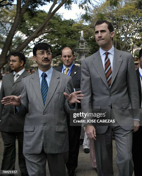 Spain's Crown Prince Felipe de Borbon speaks with Antigua Guatemala's first councilor Enrique Berduo during a short visit to the colonial city, in...
