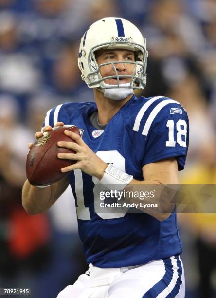 Quarterback Peyton Manning of the Indianapolis Colts looks to pass against the San Diego Chargers during their AFC Divisional Playoff game at the RCA...