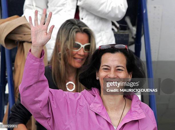 Former FARC hostage Colombian politician Clara Rojas waves upon her arrival to Catam military airport, in Bogota, 13 January 2008. Rojas, who had...
