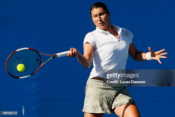 Sandra Kloesel of Germany plays a forehand during her first round match against Julia Schruff of Germany on day one of the Australian Open 2008 at...