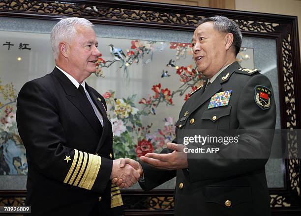 Commander of the Pacific Fleet, Admiral Timothy Keating shakes hand with Chinese Chief of General Staff Department General Chen Bingde upon arrival...