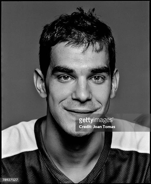 Spanish basketball player Jose Manuel Calderon poses for a portrait shoot at home for XL Semanal magazine on December 7, 2006 in Barcelona, Spain.