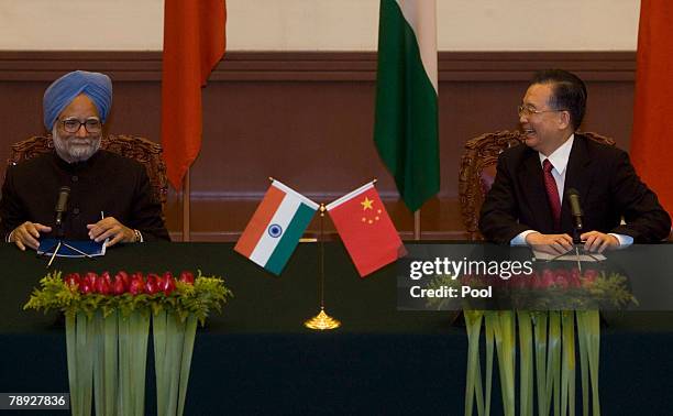 Indian Prime Minister Manmohan Singh, and Chinese Premier Wen Jiabao, attend a press conference after a signing ceremony held at the Great Hall of...