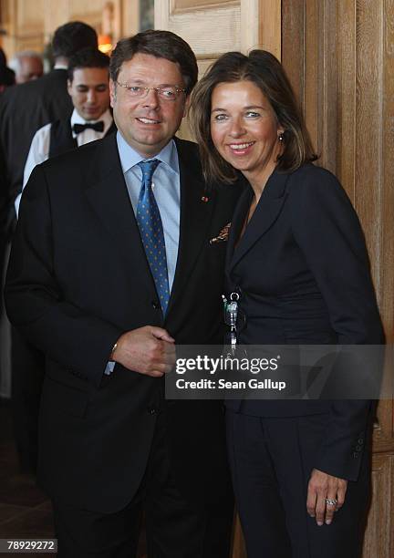 Deutsche Entertainment AG Chairman Peter Schwenkow and his wife Inga Griese-Schwenkow attend the annual New Year Reception at German publishing giant...