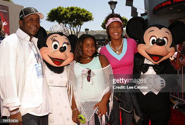 Bobby Brown, Minnie Mouse, daughter Bobbi Kristina, Whitney Houston and Mickey Mouse