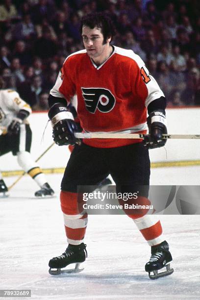 Joe Watson of the Philadelphia Flyers plays against the Boston Bruins .