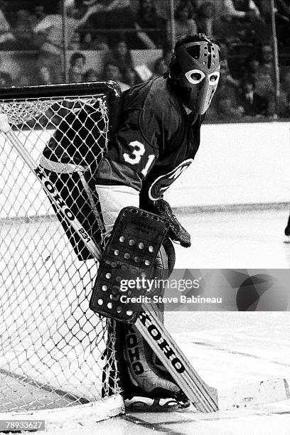 Billy Smith of the New York Islanders in net against the Boston Bruins.