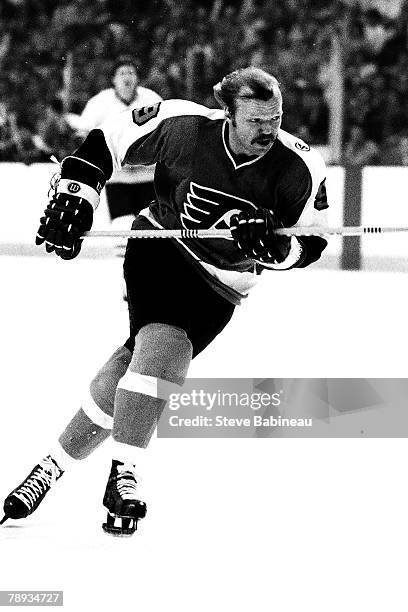 Bob Kelly of the Philadelphia Flyers skates up the ice against the Boston Bruins.
