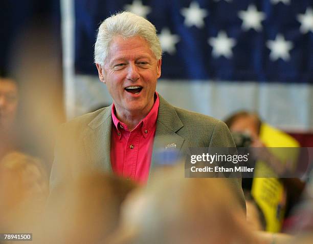 Former U.S. President Bill Clinton smiles as he is introduced at the Centennial Hills Community Center to campaign for his wife, Sen. Hillary Clinton...