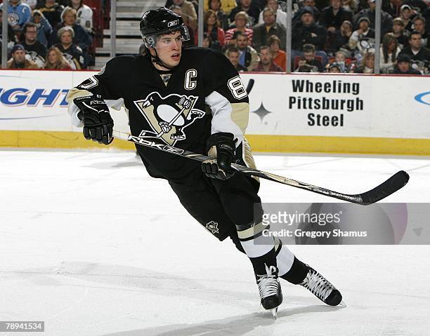 Sidney Crosby of the Pittsburgh Penguins keeps an eye on the puck during a game against the Florida Panthers on January 5, 2008 at Mellon Arena in...