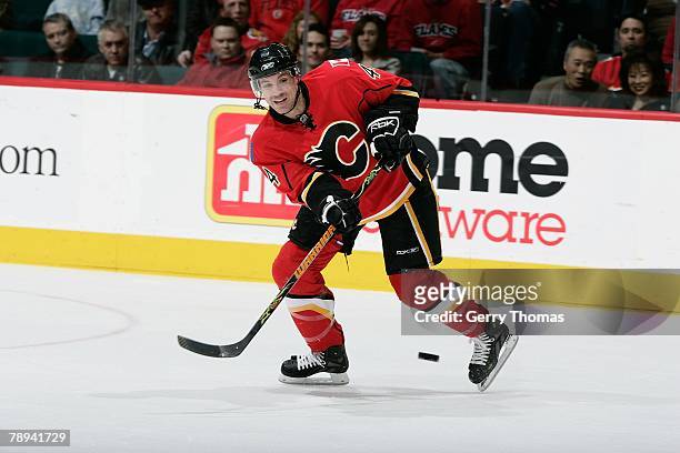 Rhett Warrener of the Calgary Flames shoots the puck against the New York Islanders on January 11, 2008 at Pengrowth Saddledome in Calgary, Alberta,...