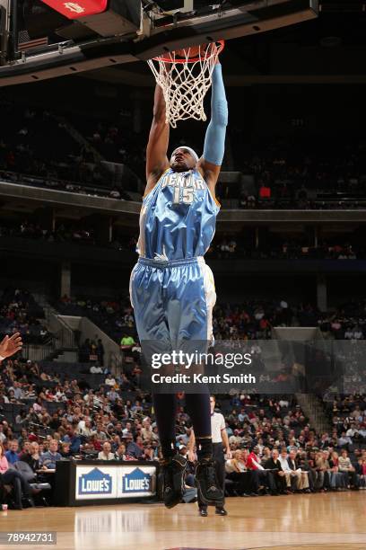 Carmelo Anthony of the Denver Nuggets dunks against the Charlotte Bobcats on January 14, 2008 at the Charlotte Bobcats Arena in Charlotte, North...