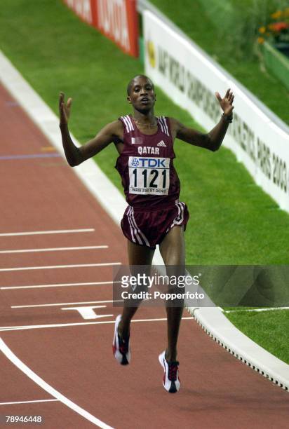 9th World Championships in Athletics, Paris, France, 26th August 2003, Mens 3000m Steeplchase Final, Saif Saaeed Shaheen of Qatar celebrates victory...