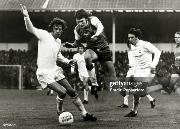 21st May 1974, UEFA,Cup Final, Ist Leg, Tottenham Hotspur 2, v Feyenoord 2, Feyenoord forward Theo De Jong jumps past a challenge from Tottenham...